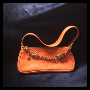 Small orange handbag from Juicy Couture